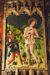 (detail) van een Castiliaans altaarstuk met St. Sebastian door Spanish School